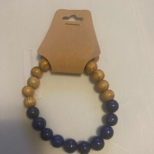 New bracelet wood and blue stone.